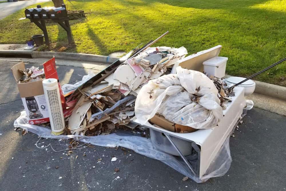 Household furniture and renovation debris prepared for an estate cleanout in Fry's Spring, Charlottesville.